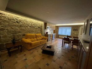Apartment, 1 Bedroom | Living area | 2-inch flat-screen TV with cable channels, TV