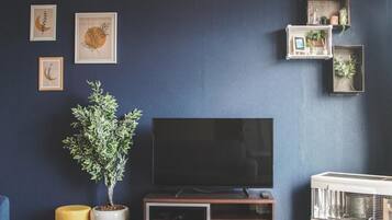 Villa, Garden View | Living area | Flat-screen TV, DVD player