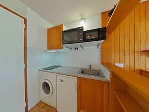 Fridge, microwave, coffee/tea maker, toaster