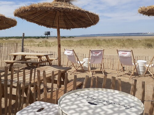 Appartement confortable avec jardin privatif, proche plage, idéal pour couple