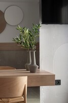 Suíte estúdio luxo, 1 cama King e sofá-cama | Ferros/tábuas de passar roupa, Wi-Fi de cortesia