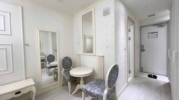 Hair dryer, towels, soap, toilet paper