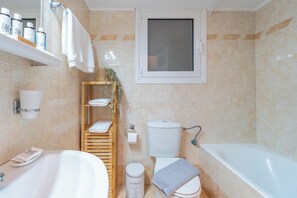 Hair dryer, towels, soap, shampoo