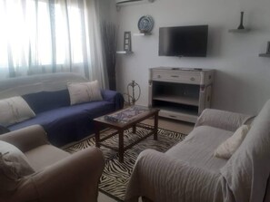 Living area - A corner of paradise, surrounded by a majestic olive grove, 5 minutes from the beach. (Midoun)