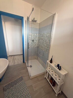 Shower, eco-friendly toiletries, hair dryer, bidet
