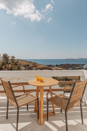 Deluxe Triple Room, Balcony, Sea View | In-room safe, laptop workspace, blackout drapes, soundproofing - Aelo Mykonos hotel (Mykonos)
