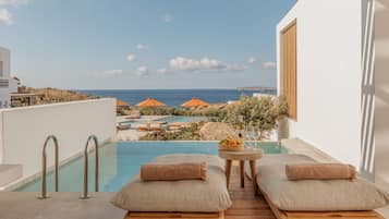 Deluxe Suite, Balcony, Sea View | In-room safe, laptop workspace, blackout curtains, soundproofing