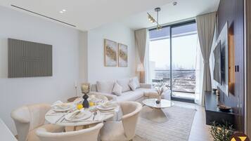 Luxury Apartment, Balcony, City View | In-room dining
