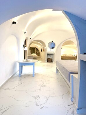 Superior Apartment | Living area | 32-inch flat-screen TV with digital channels - Cave Crafted Suites (Santorini)