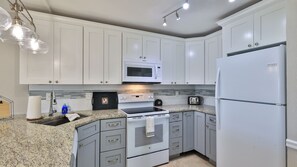 Fridge, microwave, oven, stovetop - BEACH CONDO-Steps to Beach Great Ocean & River Views Pool WiFi & Cable SP5G (Daytona Beach)