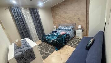 2 quartos, ferros/tábuas de passar roupa, Wi-Fi, roupa de cama