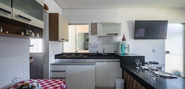 Fridge, microwave, stovetop, coffee/tea maker