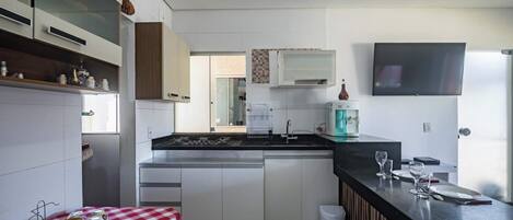 Fridge, microwave, stovetop, coffee/tea maker