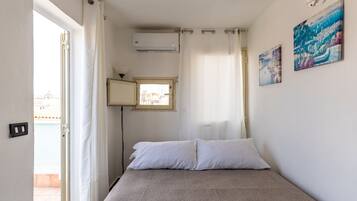 1 chambre, fer et planche à repasser, Wi-Fi gratuit, draps fournis