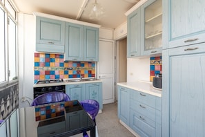 Fridge, oven, electric kettle, cookware/dishes/utensils