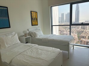 2 chambres, fer et planche à repasser, Wi-Fi, draps fournis