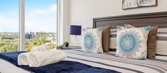 Stylish 1BR Condo w Balcony & Skyline Views
