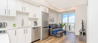 Stylish 1BR Condo w Balcony & Skyline Views