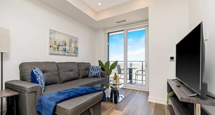 Stylish 1BR Condo w Balcony & Skyline Views
