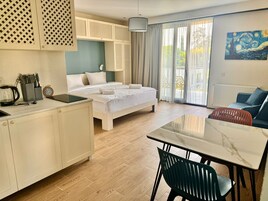 Economy Apartment, Partial Sea View | In-room safe, blackout drapes, iron/ironing board, free WiFi