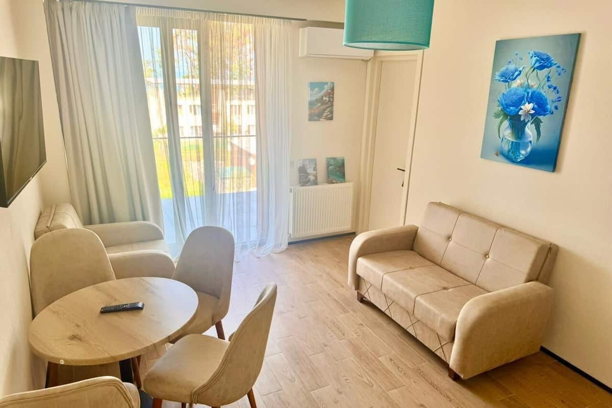 Appartamento Classic, 1 letto matrimoniale con divano letto, vista spiaggia | Area soggiorno