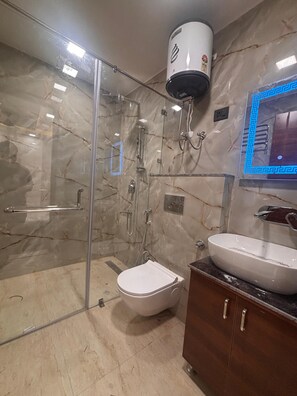 Shower, jetted tub, towels, soap