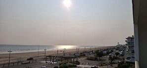 On the beach, sun loungers, beach towels