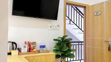 Basic Double Room, 1 Queen Bed, City View | Television