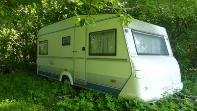 Caravan and campsite in the countryside near the lake and beach