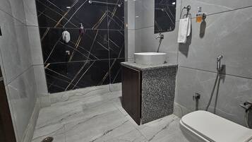 Shower, towels, soap, shampoo