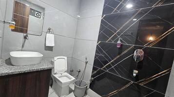 Shower, towels, soap, shampoo