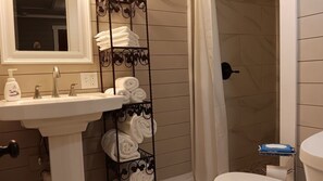 Shower, hair dryer, towels