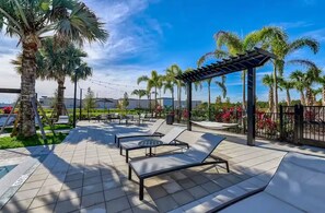 Terrace/patio - Modern Retreat Near Disney– Balcony Fireworks View• King Bed • Resort Pool & Gym (Kissimmee)