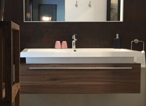 Your lodge with private hot tub | Bathroom | Shower, hair dryer, towels, soap