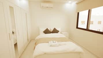 Deluxe Suite, City View | Desk, iron/ironing board, free WiFi