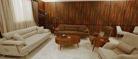 A modern living room with a sectional sofa, armchairs, a coffee table, and a wooden accent wall.