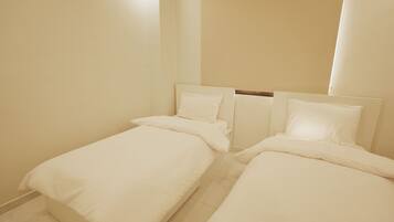 Suite Deluxe, vue ville | Bureau, fer et planche Ă repasser, Wi-Fi gratuit