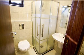 Shower, free toiletries, towels, soap