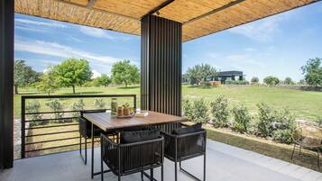 Cottage Deluxe, patio, vue jardin | Terrasse/Patio