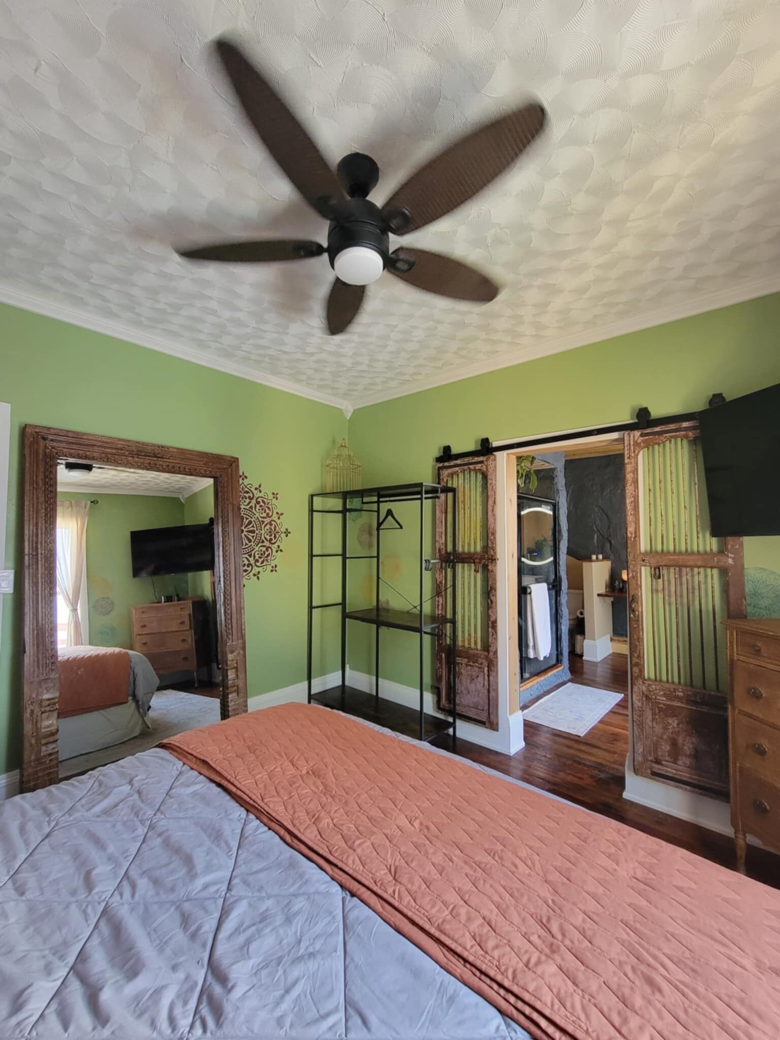 Master bedroom with private master bath and king bed