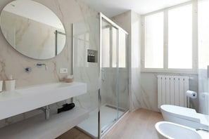 Hair dryer, bidet, towels, soap
