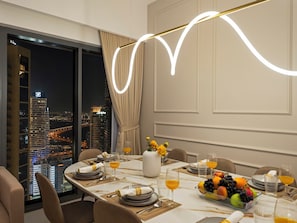 Panoramic Apartment, 4 Bedrooms, City View | Dining room - Panoramic Burj Khalifa View by Propigo (Dubai)