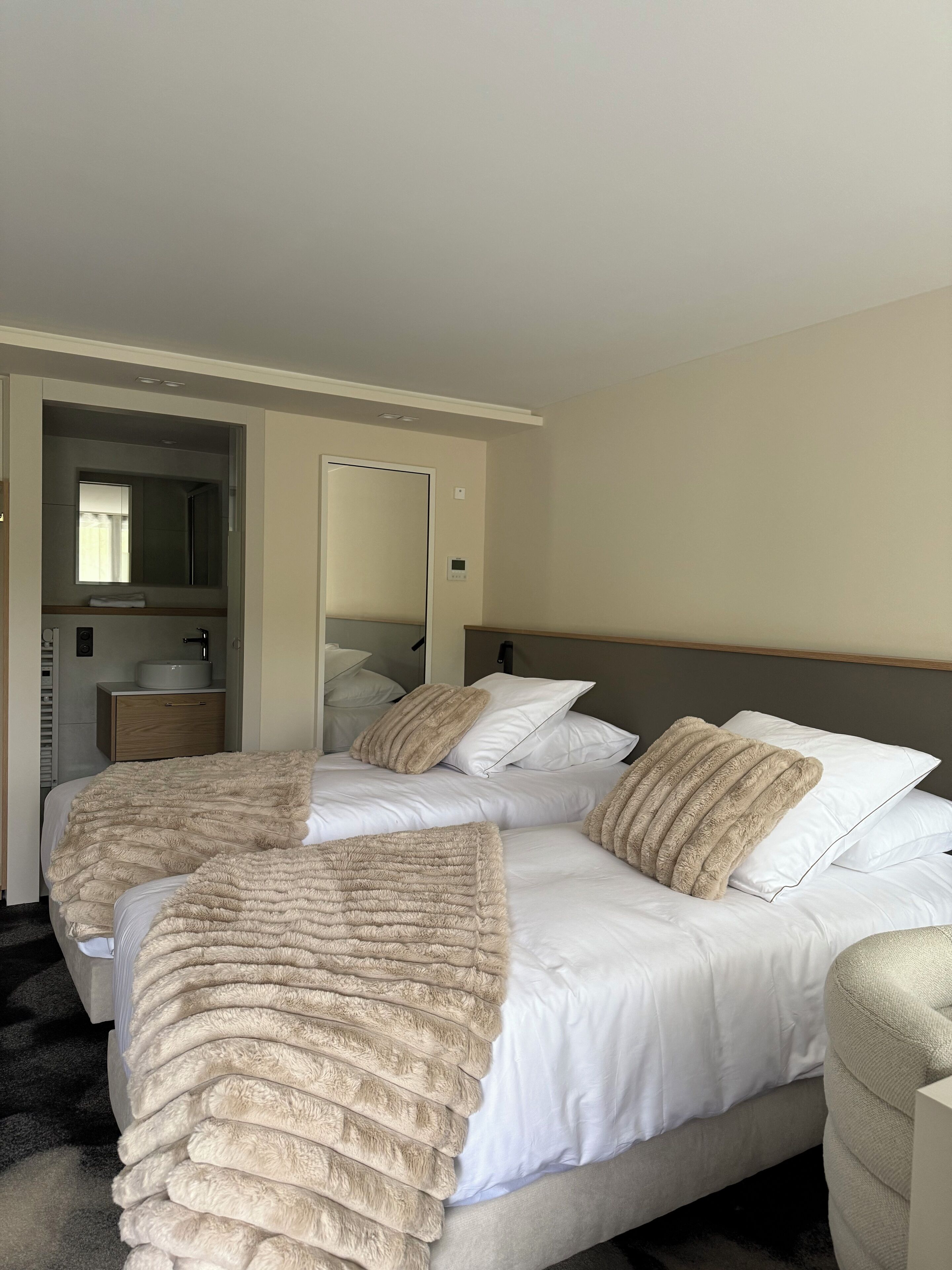 Luxe beddengoed, donsdekens, Select Comfort-bedden, een minibar