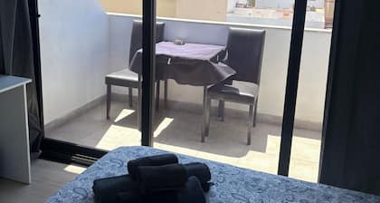 Room with private bathroom and private terrace. 3rd floor of the building