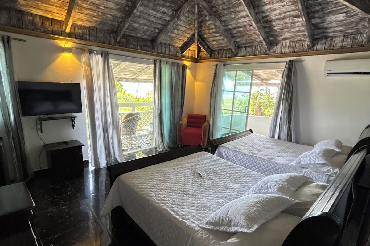 Comfort Room, Beach View, Sea Facing | Down comforters, Select Comfort beds, individually decorated