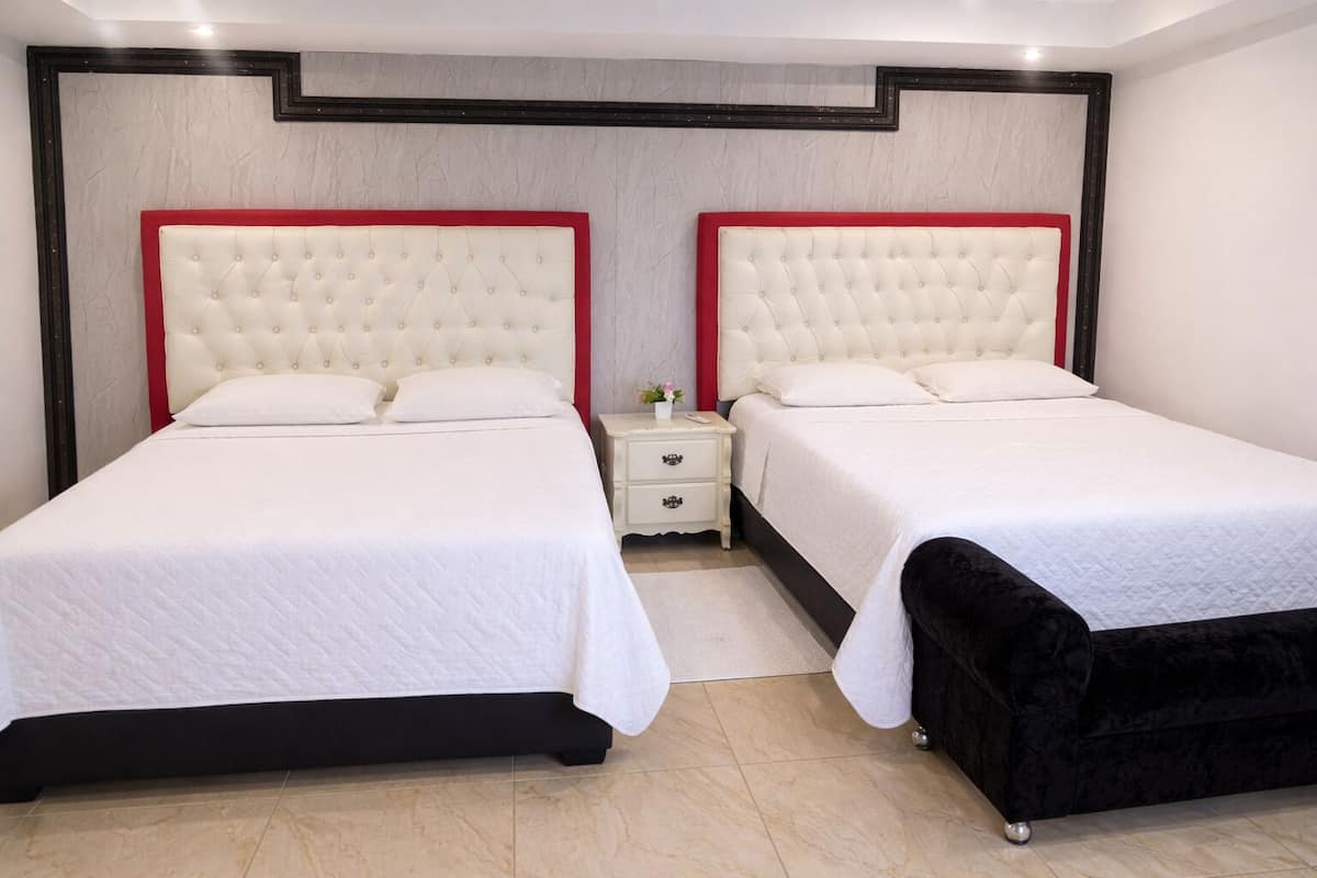 Deluxe Twin Room | Down comforters, pillowtop beds, individually decorated, desk