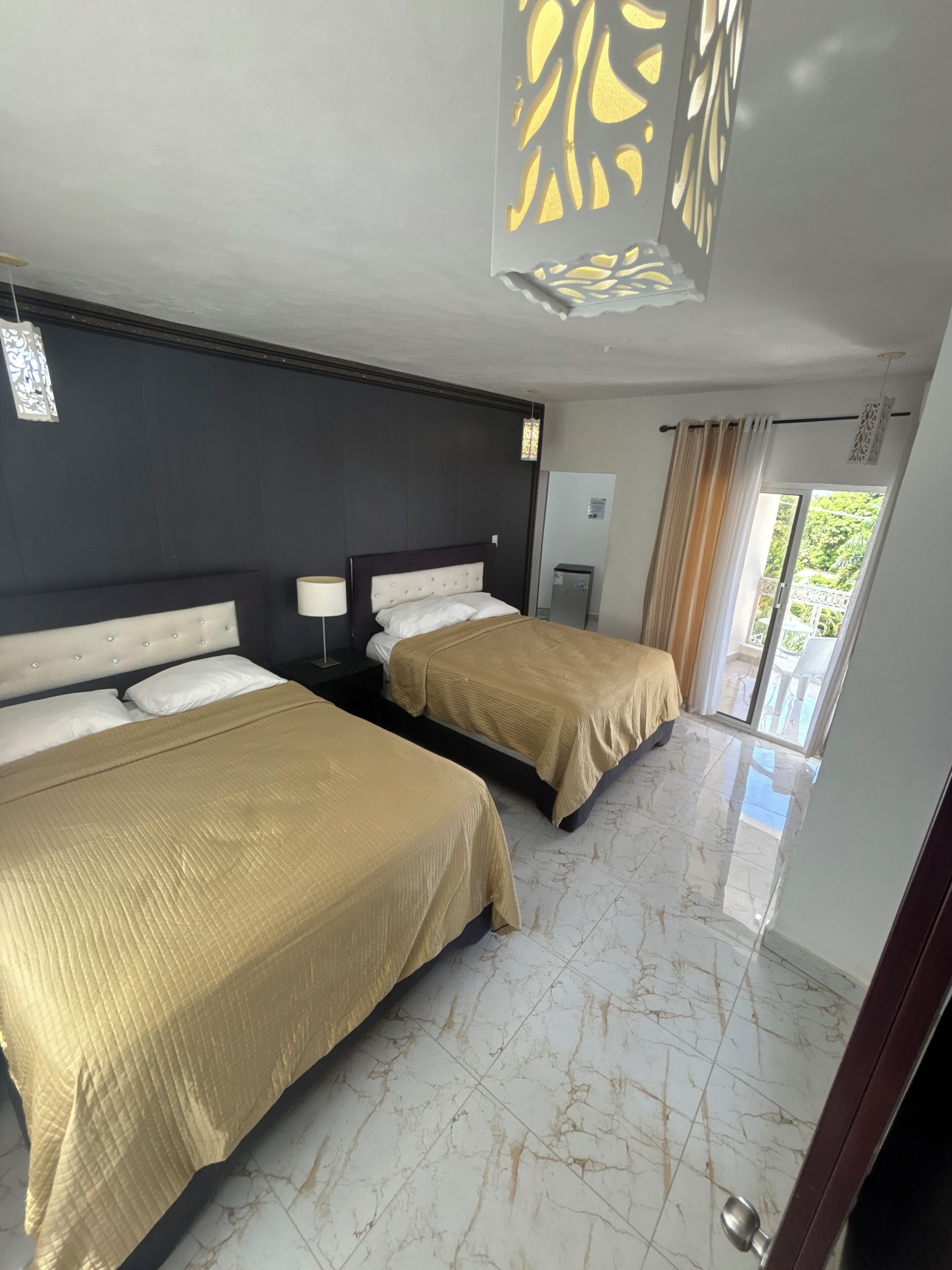 Deluxe Double Room, Balcony, Beach View | Down comforters, Select Comfort beds, individually decorated