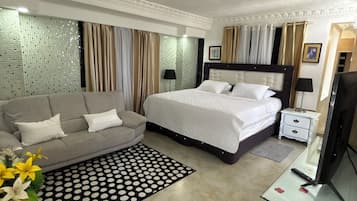 Suite estudio presidencial | Edredón, camas Select Comfort y decoración personalizada