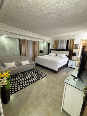 Presidential Studio Suite | Down comforters, Select Comfort beds, individually decorated
