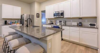 Four beds w/ 1 king, 3 queen beds each with a TV. Centrally located! No pets